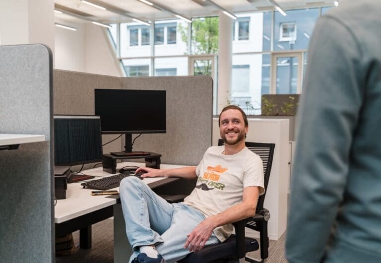 Happy Student sitting on PC