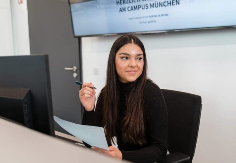 Female student taking notes