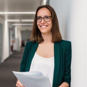 Female student happy in the hall