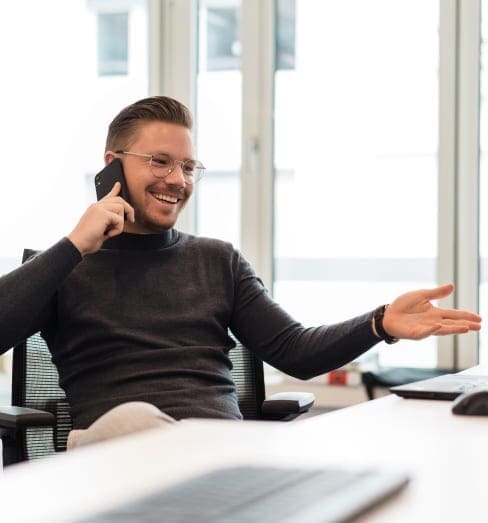 Happy Professor on the phone