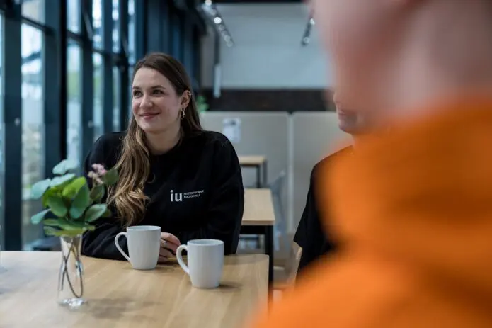 woman smiling camera Campus